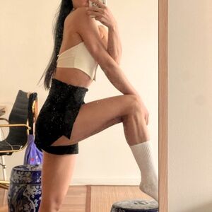 Aritzia Wilfred high-waisted belted short shorts.